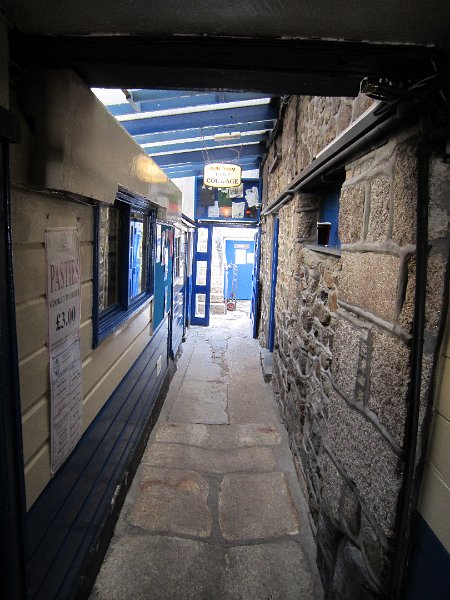 IMG_4432.JPG - The alley to the back, and my beer on a window sill. I am not sure where I am, nor in which century.